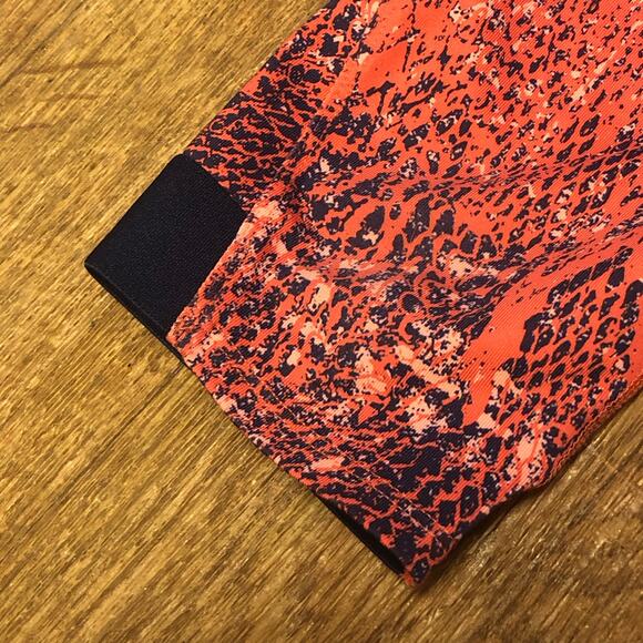 The North Face Orange Blue Abstract Motus Athletic Capri Leggings Size Small - Picture 7 of 15